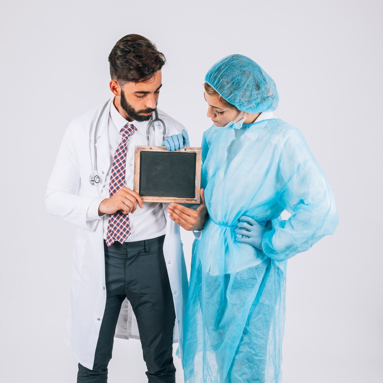 surgeon-doctor-holding-watching-blackboard_23-2147650248